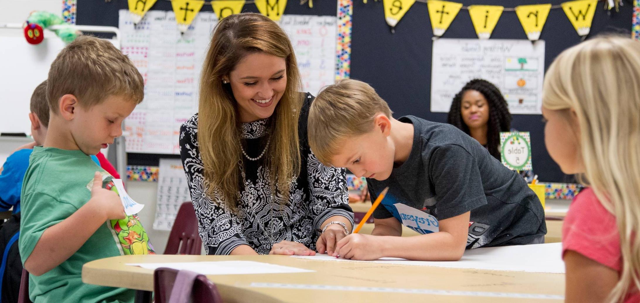 Teacher with students